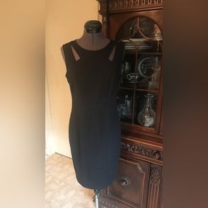 JNYD Size 4 Chic Little Black Dress with Lift & Tuck Technology.